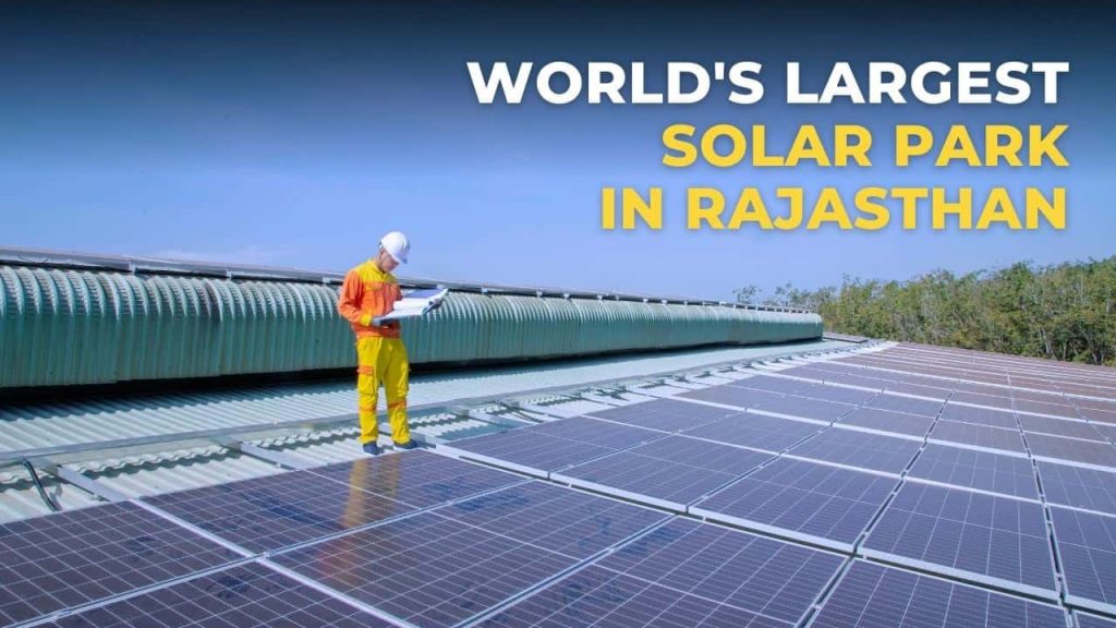 A construction worker standing in an solar power plant with the text - world's largest solar park in rajasthan