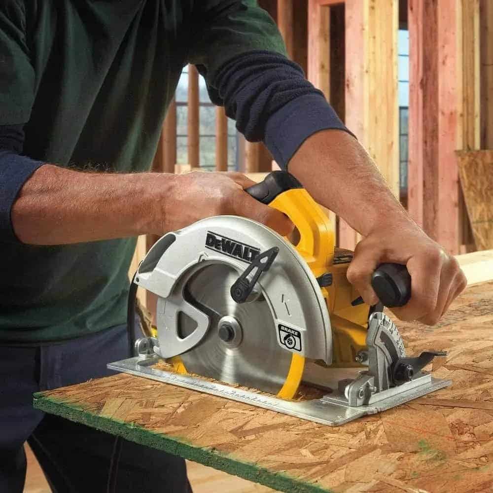 Picture of a man using powered saw