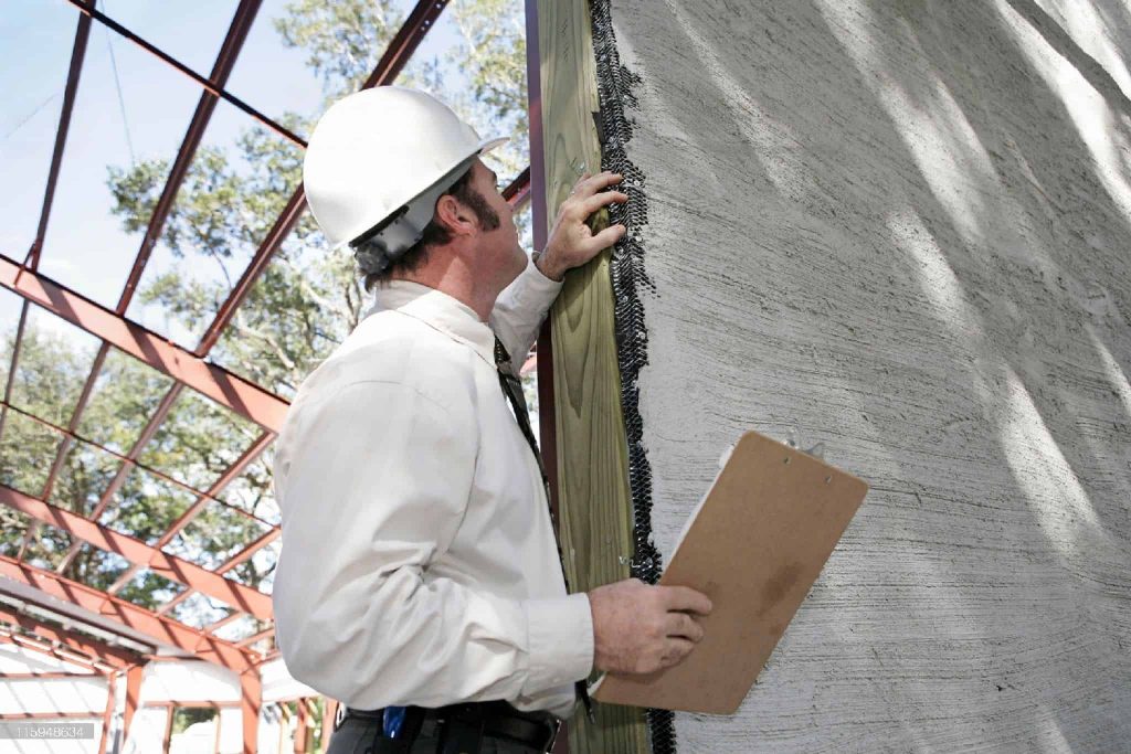 Picture of a man inspecting a construction site