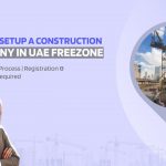 Image showing a construction site and a picture of a civil engineer of middle east. Image has the following heading text - How to setup a construction company in UAE Freezone